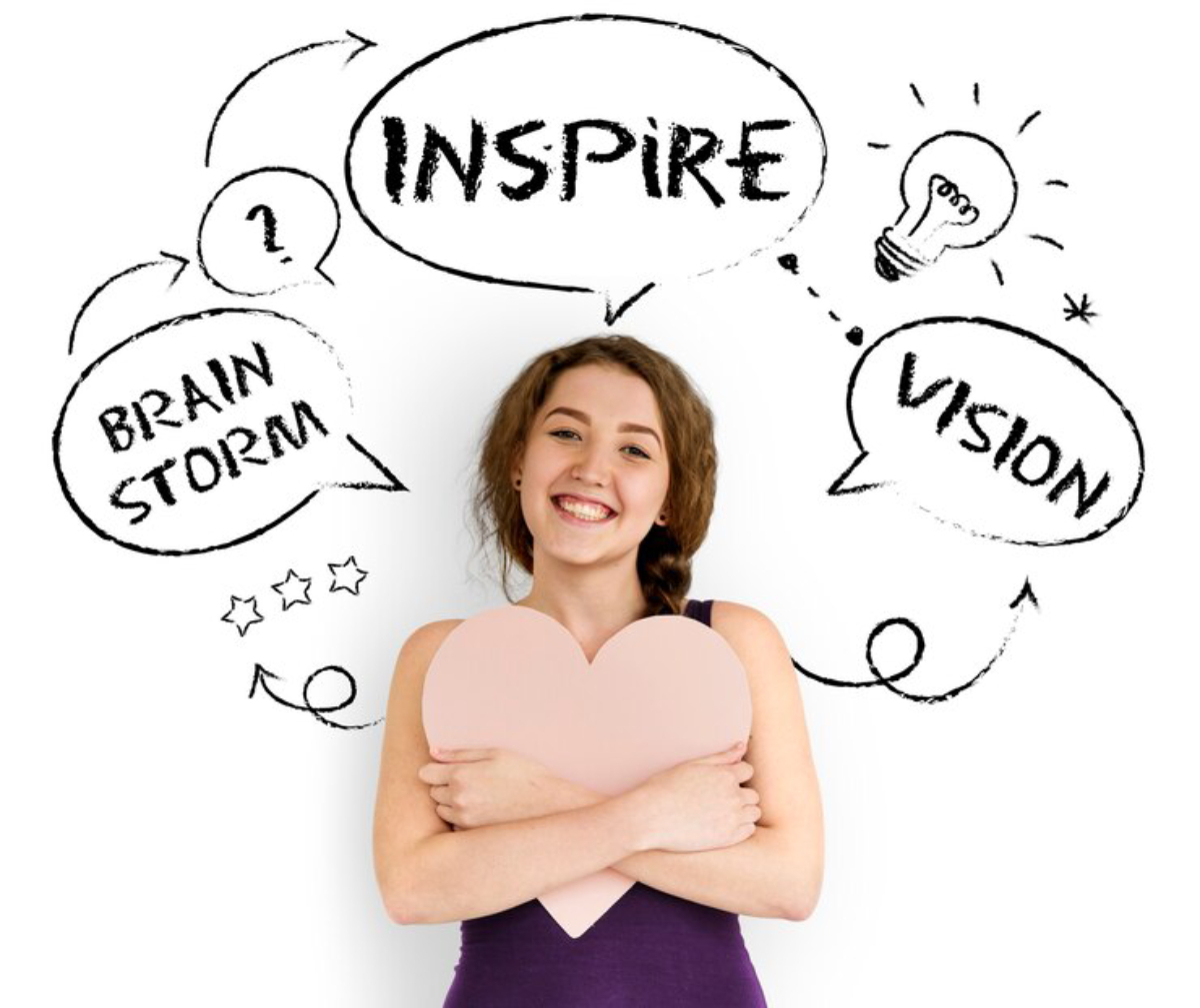 A person holds a pink heart, surrounded by thought bubbles with words like Inspire, Brainstorm, and Vision, on a white background.